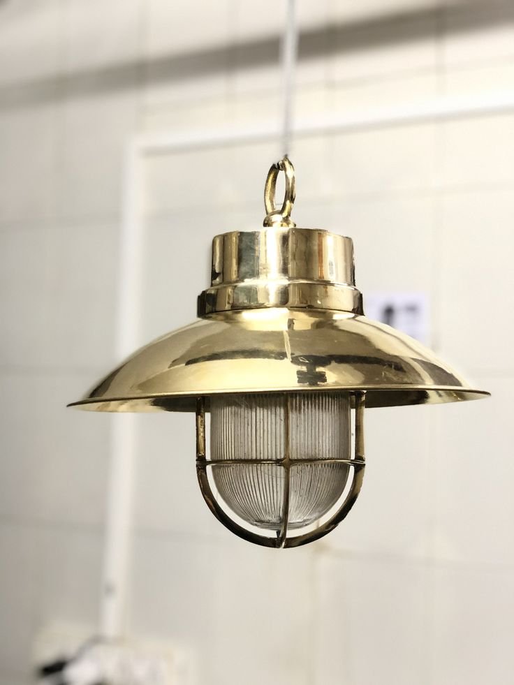 Brass cage pendant with a shade