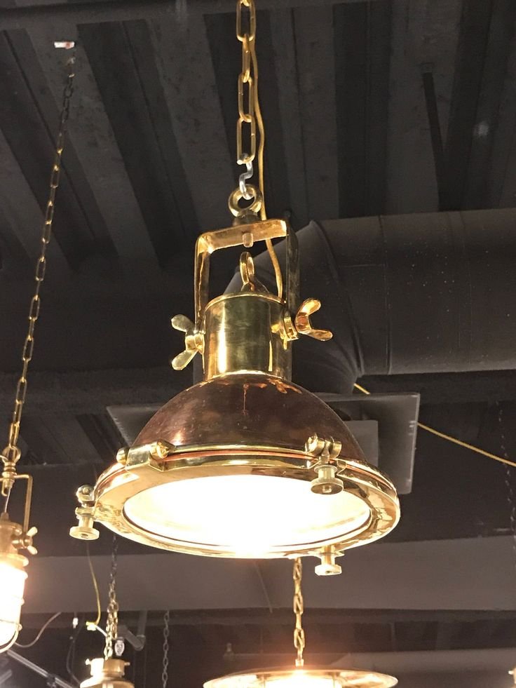 Lit brass nautical pendant light