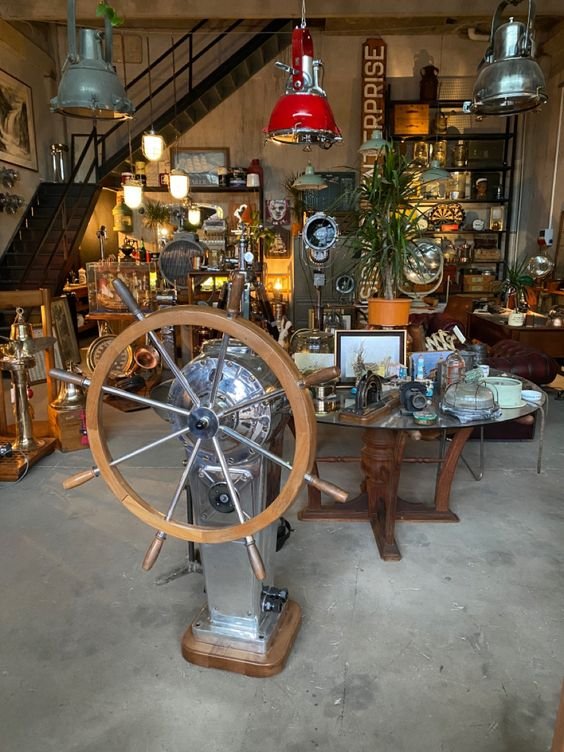 Nautical lighting and a ship's wheel from the collection